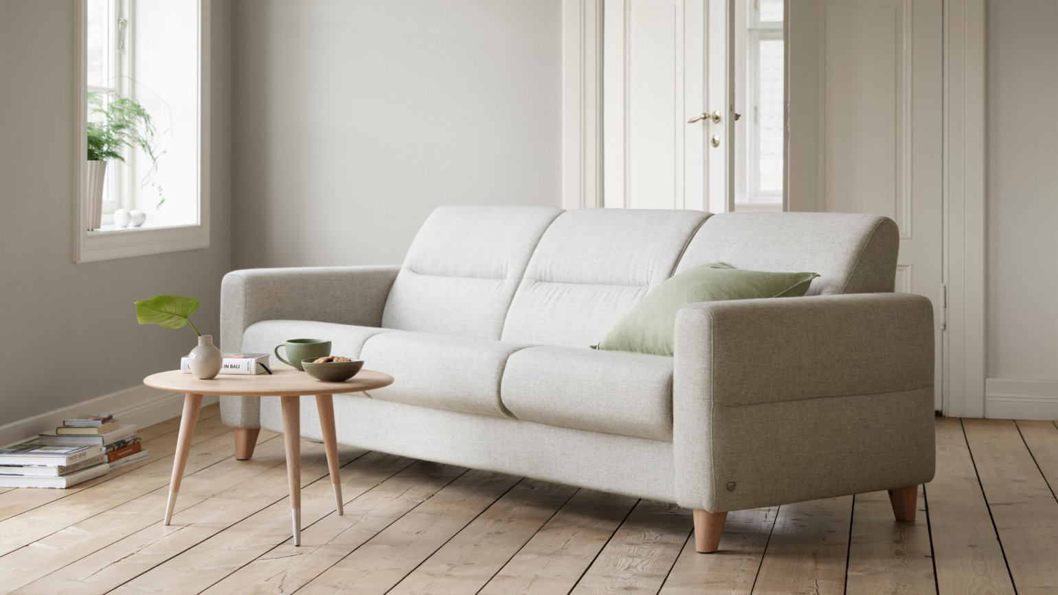 With neat proportions, Stressless Fiona has beautifully simple lines with a modern sloping back. Careful thought has been put into construction, angles and cushioning to provide exquisite comfort. The seat cushions have ComfortZones™ to enhance the softness and make the cushions adapt to your seating position. 

Choose from traditionally upholstered arms, elegant wood detailing or a more modern look with steel arms. The large selection of upholstery choices, wood and steel finishes, means you can put together a sofa that perfectly complements your existing interior design.

Please note that we only show a limited number of configurations on our website – if you require a different configuration please contact us.
