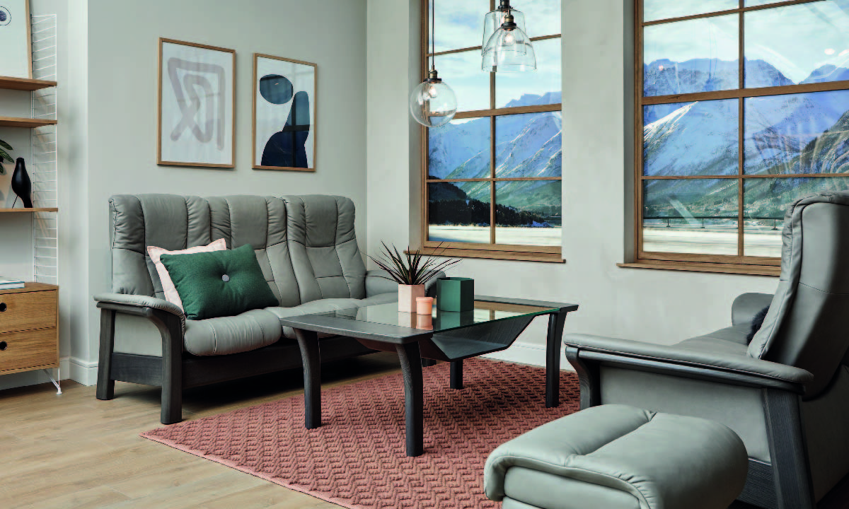 Timeless elegance meets modern functions with this beautifully cushioned, high-back sofa.
The Stressless Windsor and Stressless Buckingham are sofas that never go out of style, with their combination of soft cushions and beautiful wood.
Featuring the same design, you can choose from Stressless Windsor which is based on a medium sized seat or Stressless Buckingham which features a wider seat. They also have the Plus™-system, which means that the sofa follows your movements and provides good support in all sitting positions.
Available as a 3 Seater, 2 Seater or Chair with a wide choice of premium leathers, fabrics and wood finishes, the Buckingham brings pure, classic comfort to any living space.