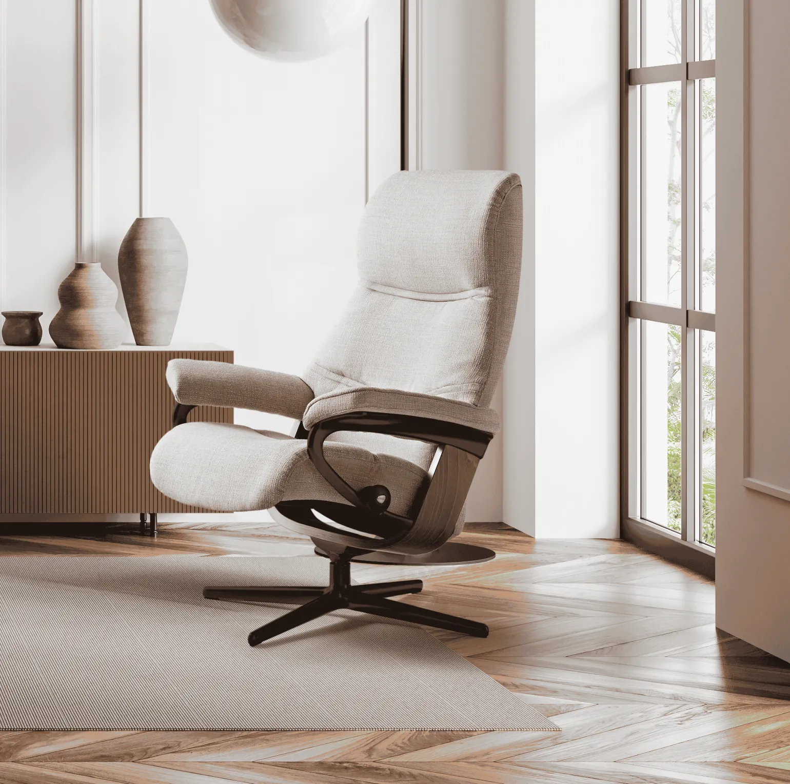 The Stressless Paul recliner is visually appealing, with curved lines and extra foam added on the sides of the backrest. The wing-shaped backrest with extra padding plus covered armrests provide the comfortable feeling of being hugged whilst sitting, alongside a smile-shaped seat that allows you to really sink into the chair. The headrest can be lengthened by up to 7cm, making Stressless Paul their tallest recliner to date.
Beneath its premium detailing, the Paul recliner features the patented Plus™ and Glide™ systems, which automatically adjust to your body’s movement.
Choose from a Cross or Signature base and customise your recliner with a variety of leathers, fabrics, wood and metal colours.